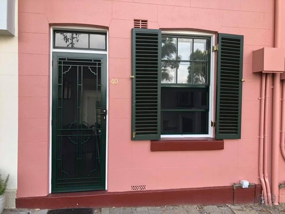 Heritage decorative screen door installed by Advanced Security Doors