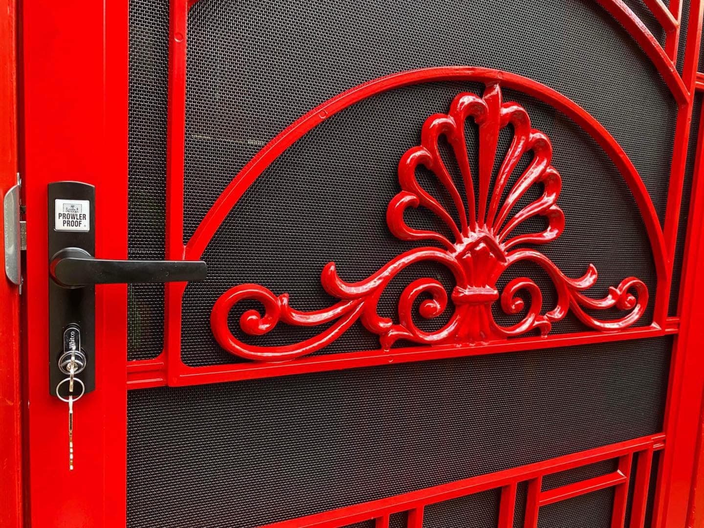 Heritage decorative screen door installed by Advanced Security Doors