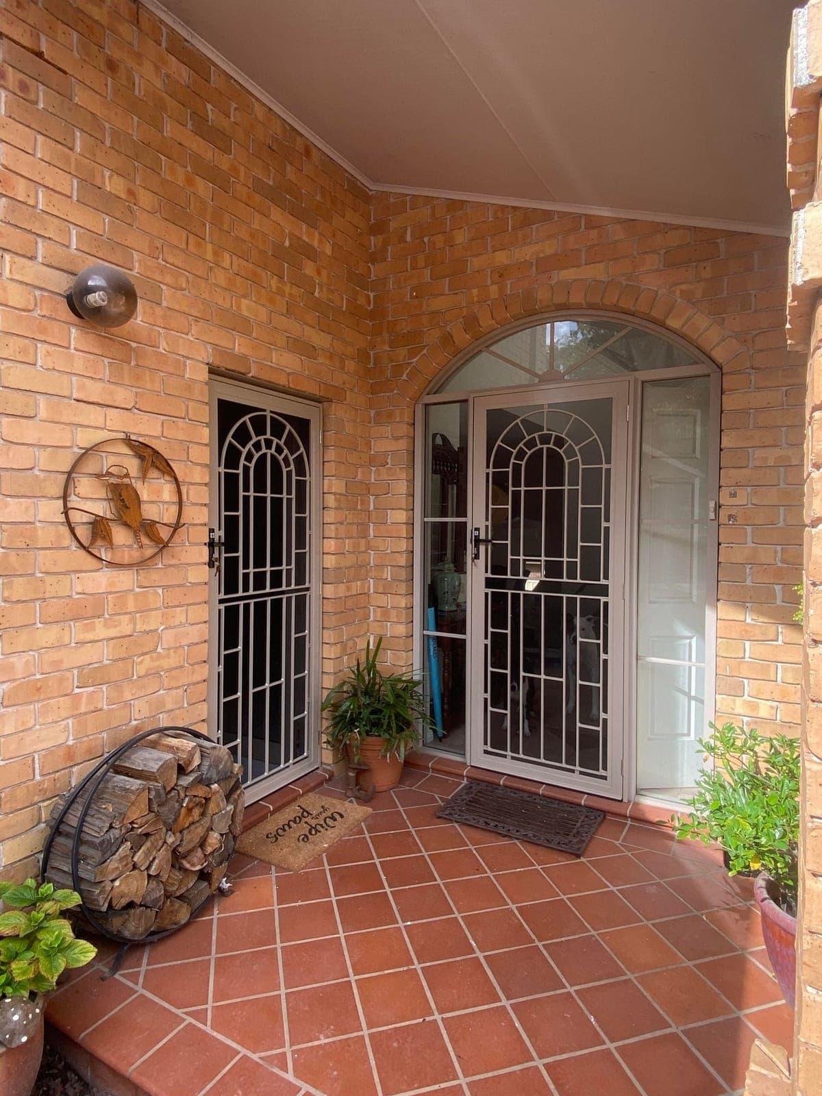 Heritage decorative screen door installed by Advanced Security Doors