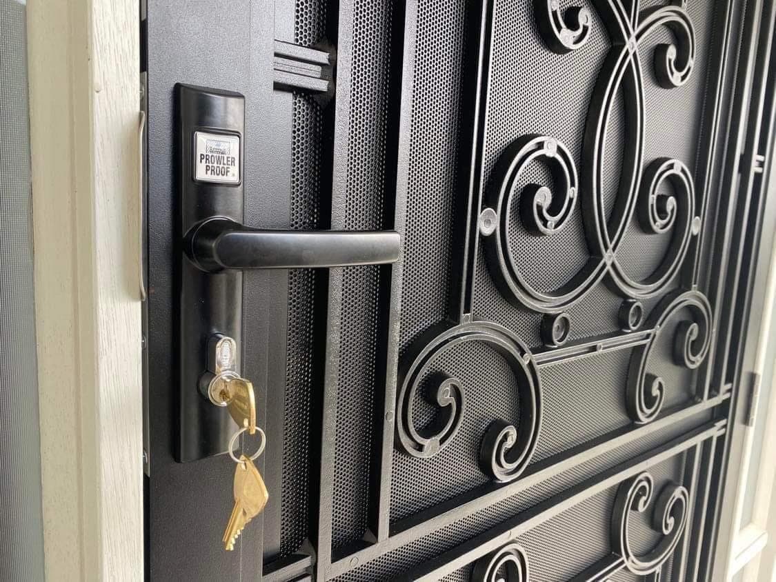 Heritage decorative screen door installed by Advanced Security Doors