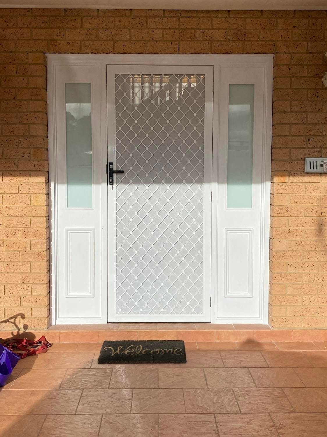 Diamond security screen door installed on a Sydney home